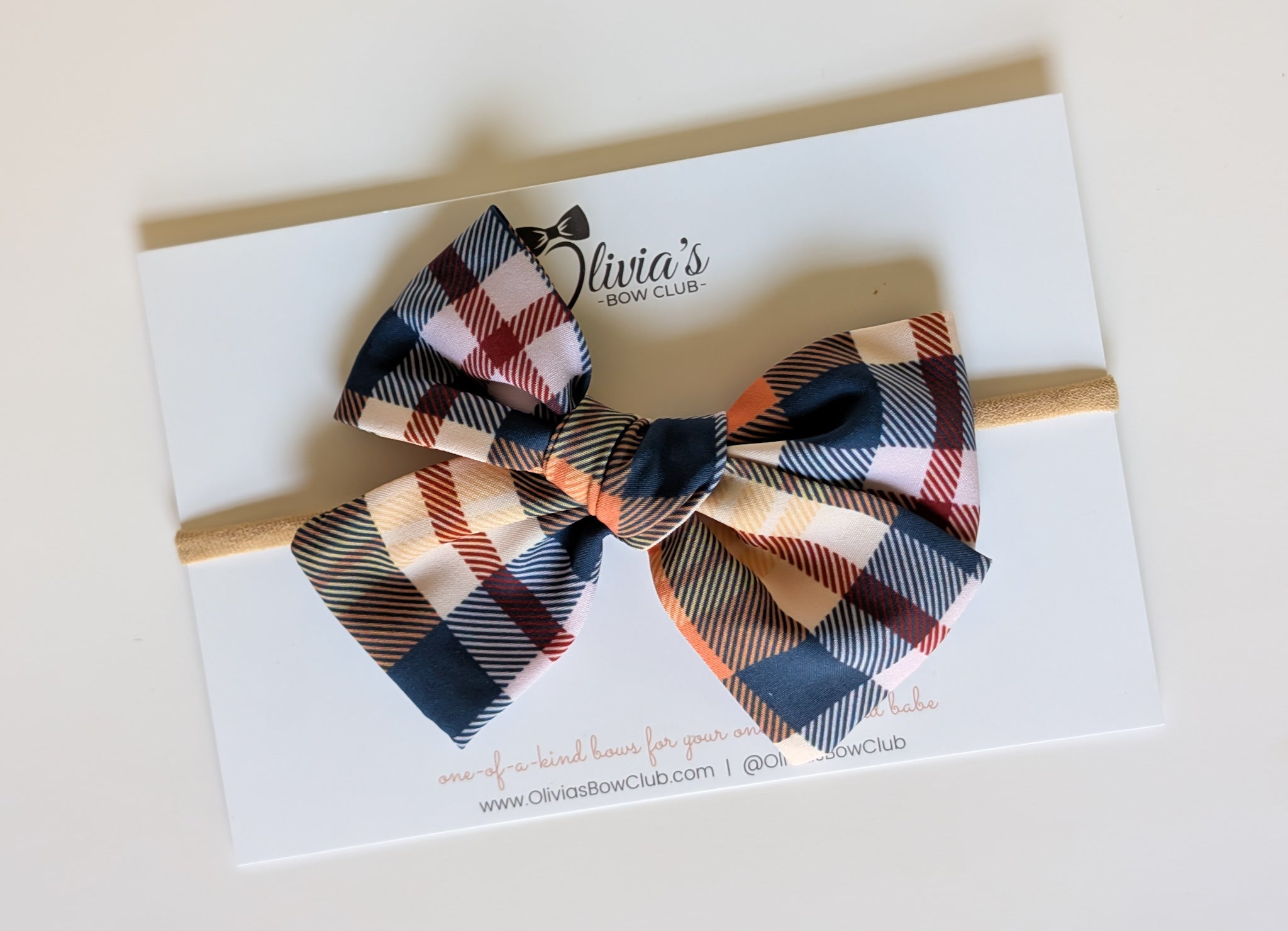 The Feature Olivia Bow